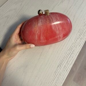 Pink Oval Clutch with Gold Accents